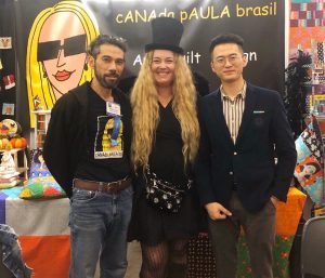 FabricsMaker team with partners at an international quilt and textile trade show