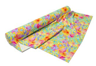 Rolled fabric bolt with a colorful floral print