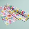 Fabric roll with a colorful watercolor floral print