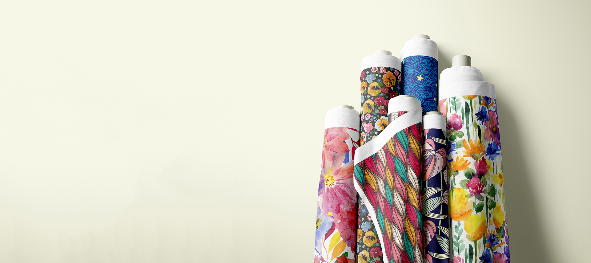 Rolled fabric bolt with a colorful floral print