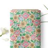 LBT1 custom fabric print folded next to fresh flowers